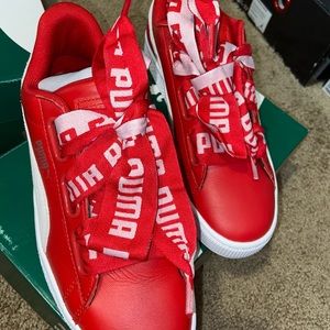 Red puma shoes